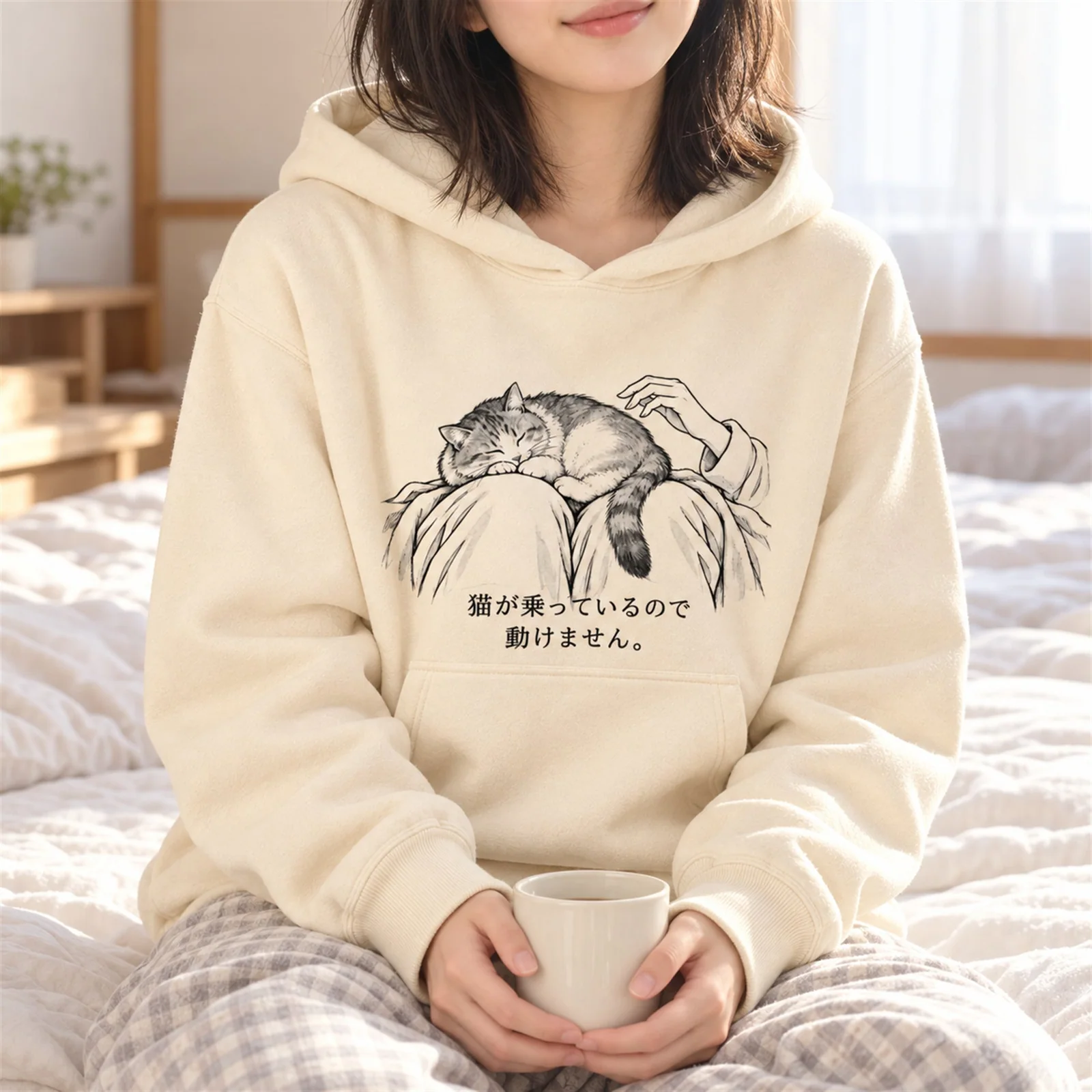 動けません。ひざ乗り猫パーカー